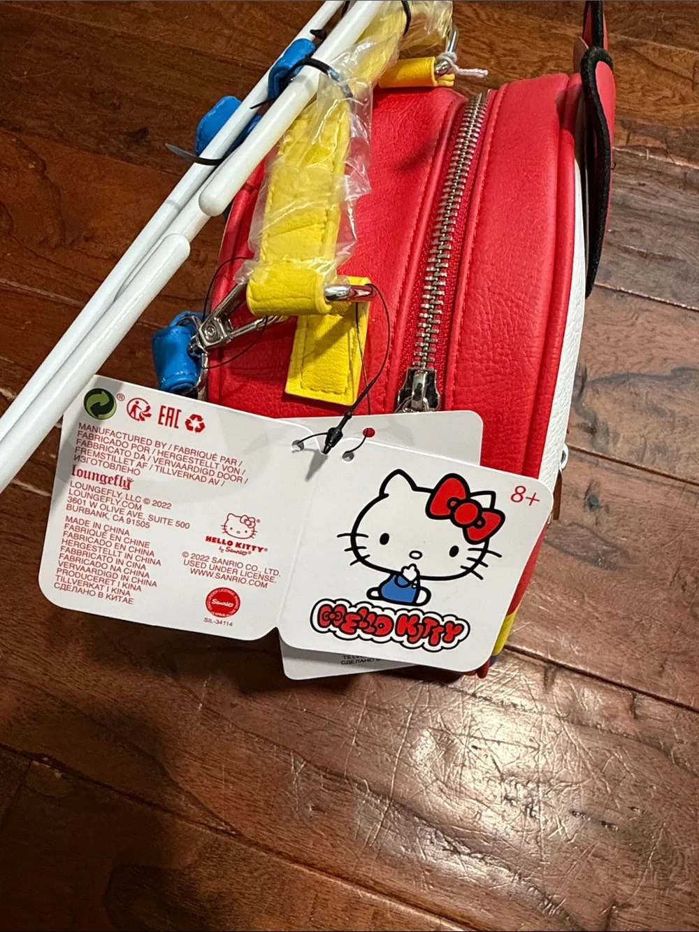 NWT Hello Kitty 45th Anniversary Striped Kids Crossbody Bag with Bow Accent